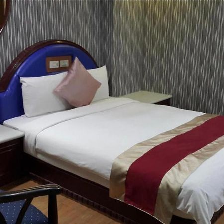 Mei Hua Hotel Гаосюн Экстерьер фото