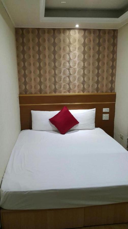 Mei Hua Hotel Гаосюн Экстерьер фото