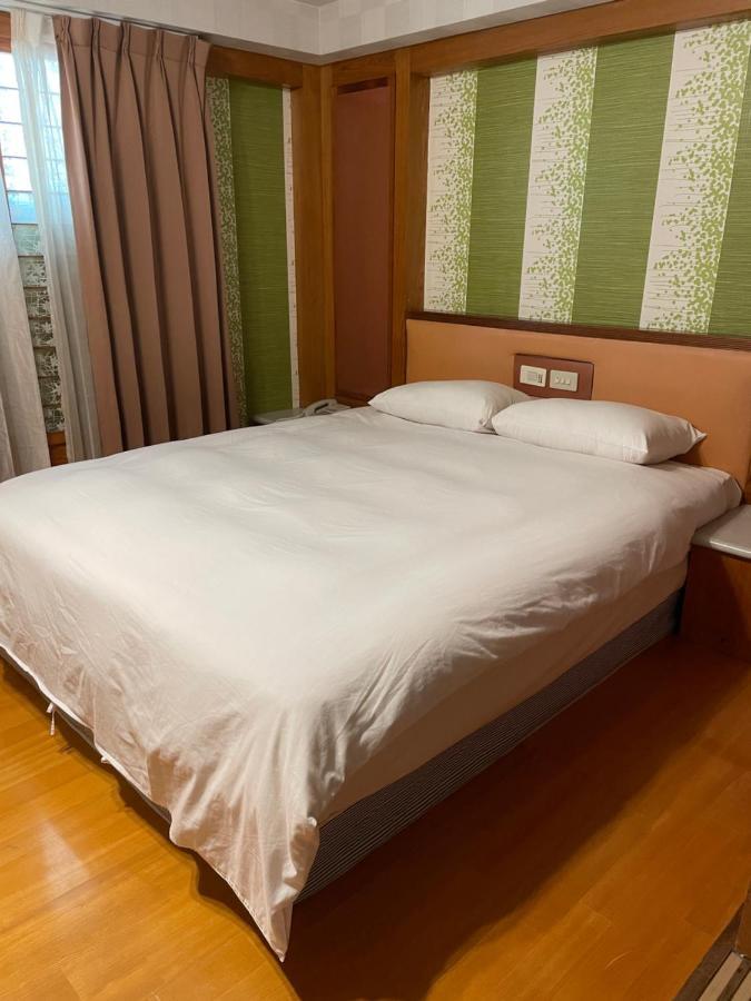 Mei Hua Hotel Гаосюн Экстерьер фото