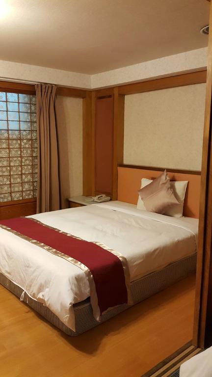 Mei Hua Hotel Гаосюн Экстерьер фото