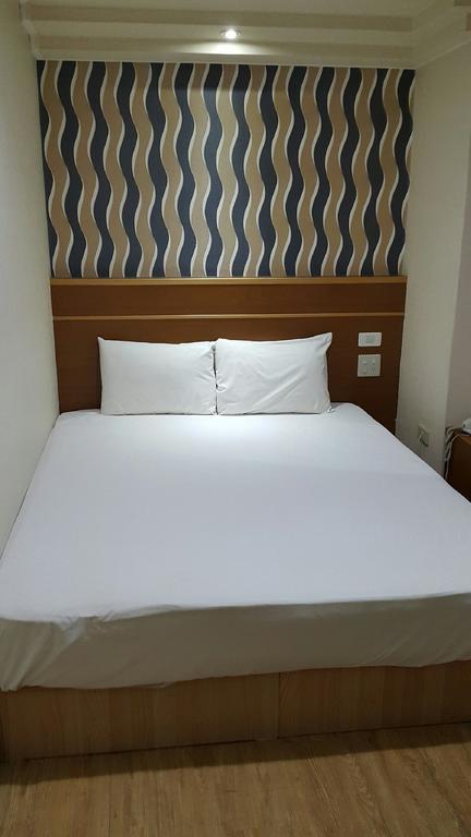Mei Hua Hotel Гаосюн Экстерьер фото