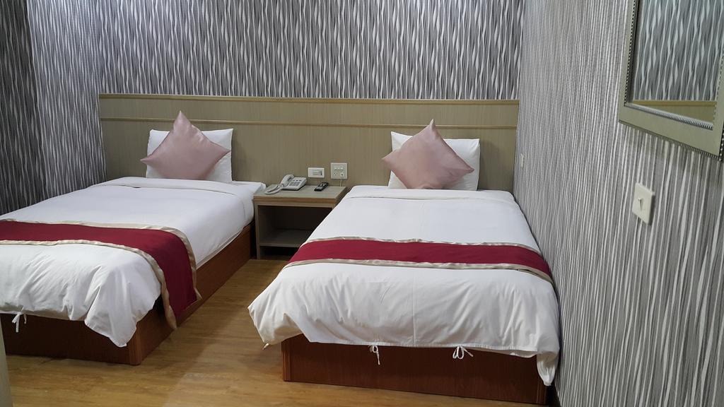 Mei Hua Hotel Гаосюн Экстерьер фото